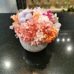 dry flowers in round ceramic pot